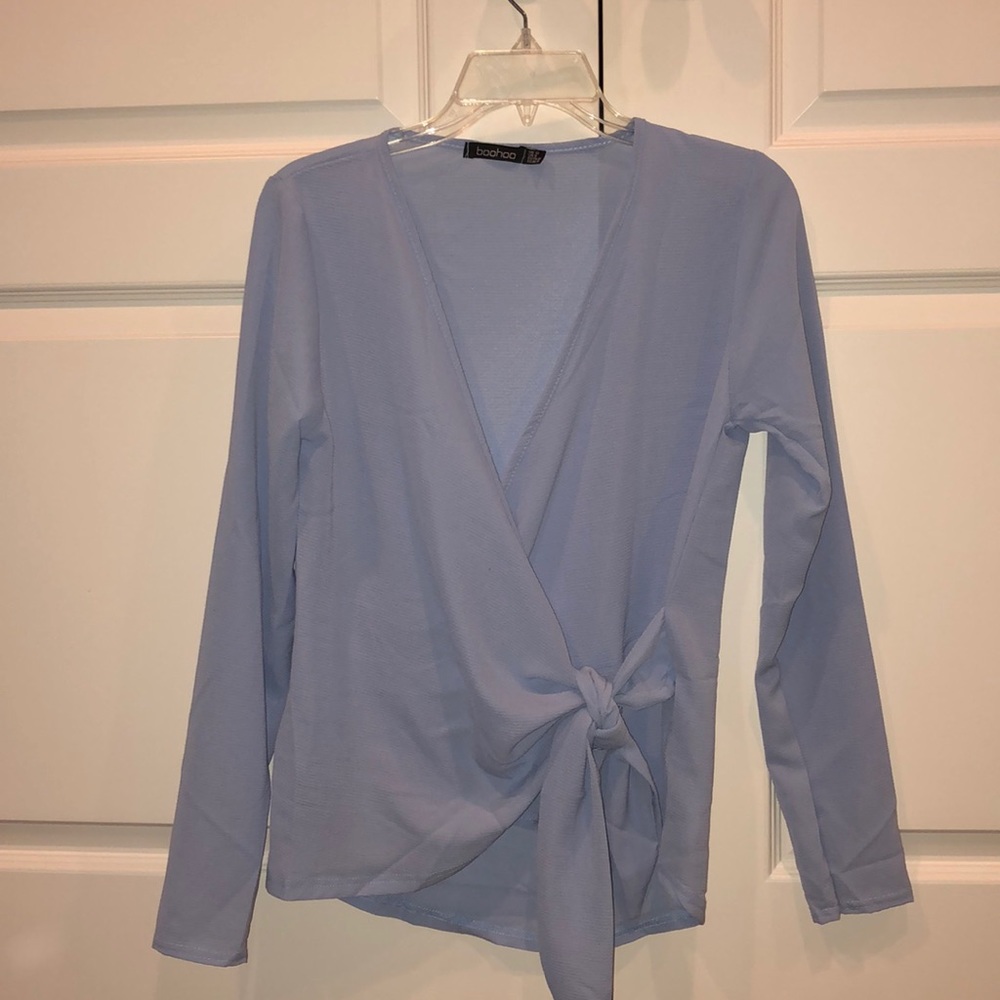 A flowy side tie long sleeve top